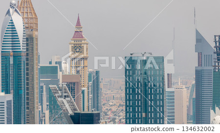 Dubai International Financial Centre district with modern skyscrapers timelapse Dubai International Financial Centre district with modern skyscrapers timelapse 134632002