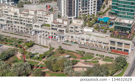 Bay Avenue Park near modern residential and office complex aerial timelapse at Business Bay 134632029