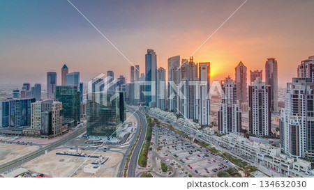 Modern residential and office complex with many towers aerial timelapse at Business Bay, Dubai, UAE. Modern residential and office complex with many towers aerial timelapse at Business Bay, Dubai, UAE. 134632030