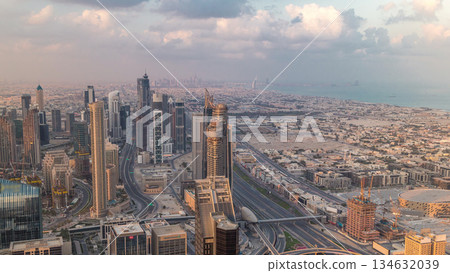 Dubai Downtown skyline futuristic cityscape with many skyscrapers and Burj Khalifa aerial timelapse. Dubai Downtown skyline futuristic cityscape with many skyscrapers and Burj Khalifa aerial timelapse. 134632039