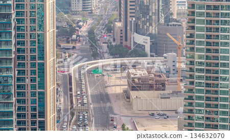 Aerial view of a road intersection in a big city timelapse. 134632070