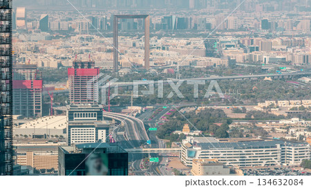 Aerial view to financial and zabeel district timelapse with traffic and under construction building with cranes from downtown 134632084