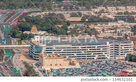 Car parking lot viewed from above timelapse, Aerial top view. Dubai, UAE Car parking lot viewed from above timelapse, Aerial top view. Dubai, UAE 134632101