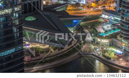 Residential and office buildings in Jumeirah lake towers district night timelapse in Dubai 134632112