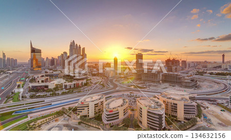 Sunset over Dubai Media City with Modern buildings aerial timelapse, United Arab Emirates Sunset over Dubai Media City with Modern buildings aerial timelapse, United Arab Emirates 134632156