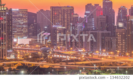 Dubai Marina skyscrapers and golf course day to night timelapse, Dubai, United Arab Emirates 134632202