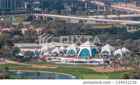 Dubai Marina skyscrapers and golf course morning timelapse, Dubai, United Arab Emirates 134632216