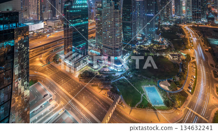 Jumeirah Lake Towers residential district aerial night timelapse near Dubai Marina Jumeirah Lake Towers residential district aerial night timelapse near Dubai Marina 134632241