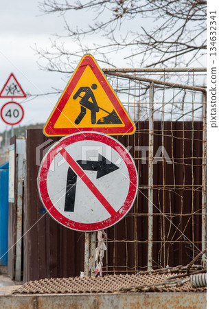 Road work and no right turn traffic signs at construction site Road work and no right turn traffic signs at construction site 134632341
