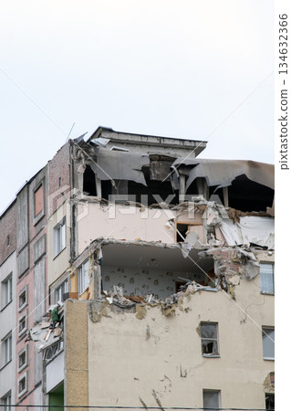 Partially demolished old apartment building during urban reconstruction 134632366