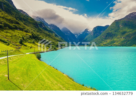 View of the glacial mountain lake Oldevatnet. Beautiful nature of Norway, Europe. 134632779