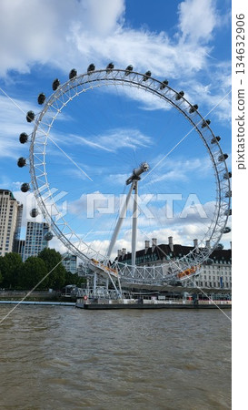 This is the famous icon in central London named the London Eye. This is the famous icon in central London named the London Eye. 134632906