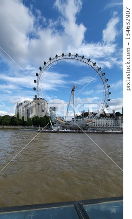 This is the famous icon in central London named the London Eye. This is the famous icon in central London named the London Eye. 134632907