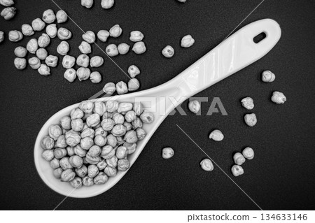 Beautiful organic dried chickpea beans consisting of raw bengal legume pea 134633146