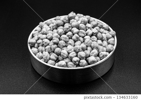 Beautiful organic dried chickpea beans consisting of raw bengal legume pea 134633160