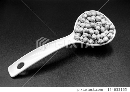 Beautiful organic dried chickpea beans consisting of raw bengal legume pea 134633165