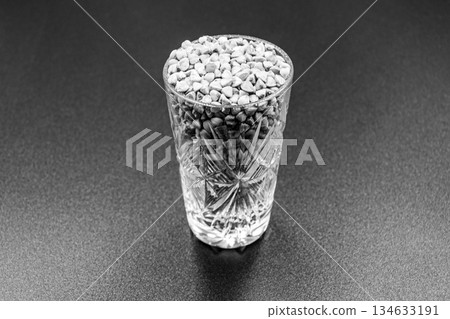 Organic dry buckwheat grains consisting of raw natural product Organic dry buckwheat grains consisting of raw natural product 134633191