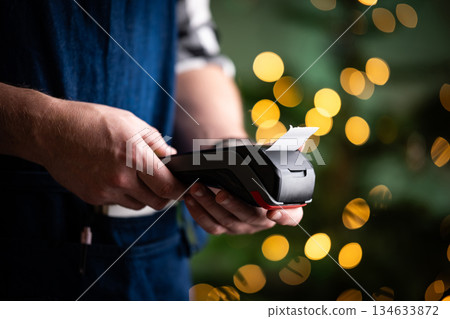 Waiter Printing A Receipt With Wireless Payment Terminal Waiter Printing A Receipt With Wireless Payment Terminal 134633872
