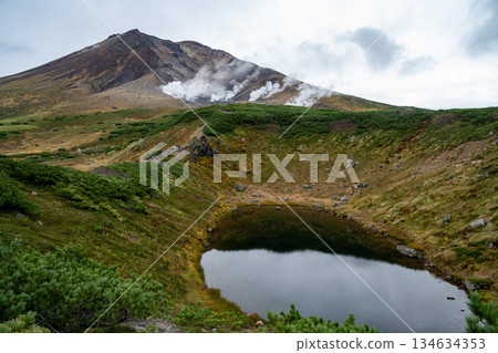 Hokkaido's highest peak, Mount Asahi in early autumn Hokkaido's highest peak, Mount Asahi in early autumn 134634353
