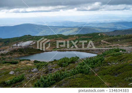 Hokkaido's highest peak, Mount Asahi in early autumn 134634383