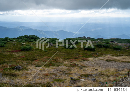 Hokkaido's highest peak, Mount Asahi in early autumn 134634384