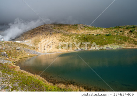 Hokkaido's highest peak, Mount Asahi in early autumn 134634409