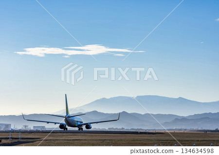 Sendai Airport at dusk, airplane taking off, Natori City, Miyagi Prefecture 134634598