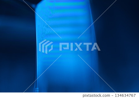 Blue bubbles, liquid glowing surface, scientific abstraction, glossy water film 134634767