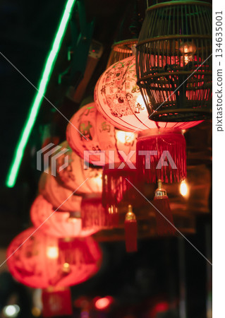 Traditional red Chinese paper lanterns hang in a row. Lantern Festival or the celebration of the secret of autumn. High quality photo Traditional red Chinese paper lanterns hang in a row. Lantern Festival or the celebration of the secret of autumn. High quality photo 134635001
