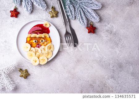 Pancakes in the shape of Santa Claus Pancakes in the shape of Santa Claus 134635571