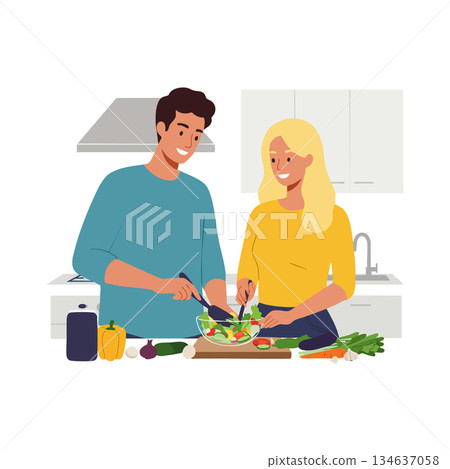 Couple cooking healthy meal together in kitchen with fresh vegetables and smiles 134637058