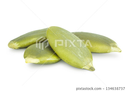 Peeled pumpkin seeds isolated on white background 134638737