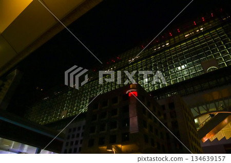 Reflection of Kyoto Tower at night, Kyoto, Japan. Travel concept. Kyoto tower is the tallest building and a major tourist attraction in Kansai region in Japan. 134639157