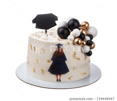 A beautifully designed cake celebrates graduation with a cap topper and elegant decorations in black, white, and gold. Perfect for any graduation party A beautifully designed cake celebrates graduation with a cap topper and elegant decorations in black, white, and gold. Perfect for any graduation party 134646947