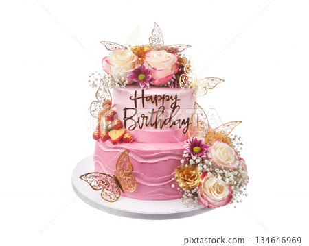A stunning birthday cake features layers in pink, adorned with fresh flowers and elegant butterflies, perfect for a joyful celebration 134646969