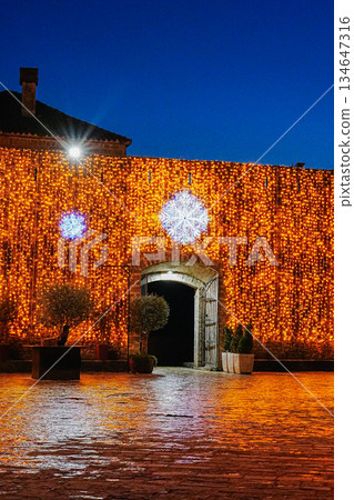 Christmas Garland Decorated Wall in Old Town Budva Montenegro Christmas Garland Decorated Wall in Old Town Budva Montenegro 134647316