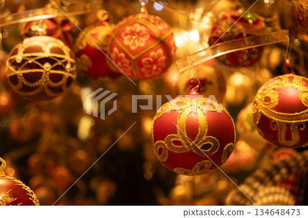 Beautiful Christmas baubles with traditional ornaments, cozy and warm Christmas card Beautiful Christmas baubles with traditional ornaments, cozy and warm Christmas card 134648473