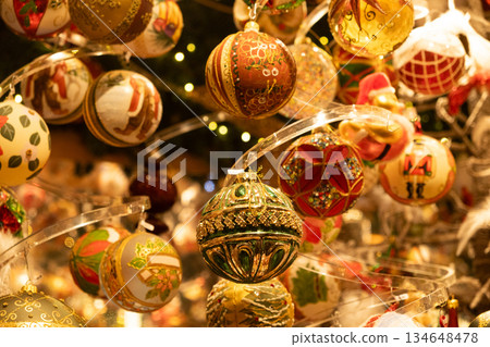 Beautiful Christmas baubles with traditional ornaments, cozy and warm Christmas card 134648478