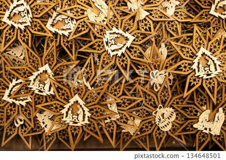 Eco-friendly Christmas decorations made of natural wood, wooden snowflake ornaments. 134648501