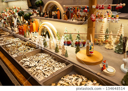 Assorted eco-friendly holiday ornaments in a gift shop at the Christmas market Assorted eco-friendly holiday ornaments in a gift shop at the Christmas market 134648514