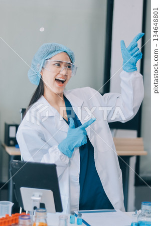 Portrait, science and happy woman on laptop in lab to research chemistry, test or innovation. Microscope, scientist and face of medical doctor in goggles for microbiology, healthcare or pharma study Portrait, science and happy woman on laptop in lab to research chemistry, test or innovation. Microscope, scientist and face of medical doctor in goggles for microbiology, healthcare or pharma study 134648801