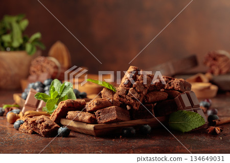 Brownie with blueberries and mint. Brownie with blueberries and mint. 134649031