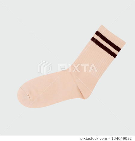 Beige sock with brown stripes on white background Beige sock with brown stripes on white background 134649052