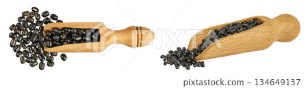 Black bean or Urad dal, black gram, vigna mungo in wooden scoop isolated on the white background. Top view. Flat lay. Black bean or Urad dal, black gram, vigna mungo in wooden scoop isolated on the white background. Top view. Flat lay. 134649137