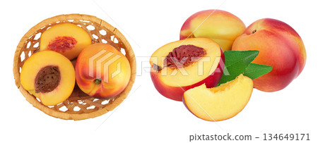 Ripe nectarine fruit with half in a wicker basket isolated on white background with full depth of field. Top view. Flat lay Ripe nectarine fruit with half in a wicker basket isolated on white background with full depth of field. Top view. Flat lay 134649171