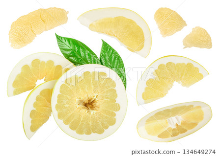 half of pomelo with slice and leaf isolated on white background. Top view. Flat lay. half of pomelo with slice and leaf isolated on white background. Top view. Flat lay. 134649274