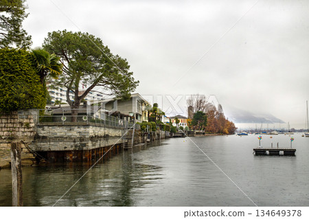 Coastline on Maggiore lake in Locarno winter time Coastline on Maggiore lake in Locarno winter time 134649378