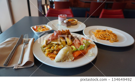 Dining Room Buffet aboard the abstract luxury cruise ship. Healthy food at modern liner concept Dining Room Buffet aboard the abstract luxury cruise ship. Healthy food at modern liner concept 134649492