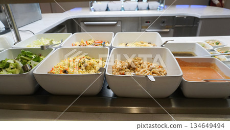 Dining Room Buffet aboard the abstract luxury cruise ship. Healthy food at modern liner concept 134649494