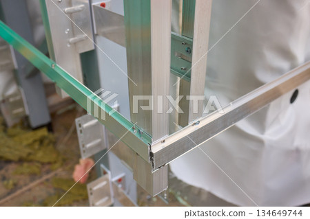 A Detailed Close Up View of the Intricate Frame Structure of a Modern Innovative Building Design 134649744